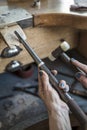 Goldsmith Working On Unfinished Ring With His Hammer Royalty Free Stock Photo