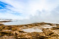 Steaming hot spring at Geysir hot spring area in Iceland Royalty Free Stock Photo