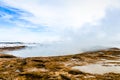 Steaming hot spring at Geysir hot spring area in Iceland Royalty Free Stock Photo