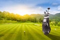 Golf bag  Golf Accessories Golf Set and Golf Ball at golf course Sunset at Background Royalty Free Stock Photo