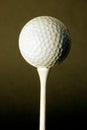 Golf ball against black background Royalty Free Stock Photo