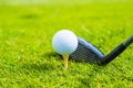 Golf ball ang club on golf green grass natural fairway Royalty Free Stock Photo