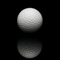 Golf ball on black background Royalty Free Stock Photo