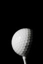 Golf ball black background Royalty Free Stock Photo