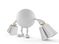 Golf ball character holding shopping bags Royalty Free Stock Photo