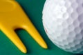 Golf Ball and Divot Repairer Royalty Free Stock Photo