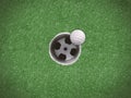Golf ball on the edge Royalty Free Stock Photo