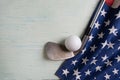 Golf ball with flag of USA on wood blue table background Royalty Free Stock Photo