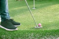 Golf ball and Golf Club on Artificial Grass. Royalty Free Stock Photo