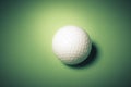 Golf ball on green background