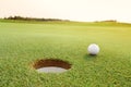 Golf ball on the green course Royalty Free Stock Photo