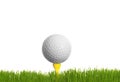 Golf ball on green grass isolated Royalty Free Stock Photo