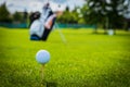 Golf ball on golf green grass natural fairway Royalty Free Stock Photo