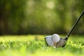 Golf ball on green grass ready to be struck on golf course background Royalty Free Stock Photo