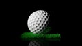 Golf ball on green turf patch Royalty Free Stock Photo