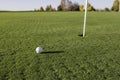 Golf Ball And Hole Royalty Free Stock Photo