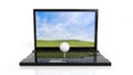 Golf ball on laptop keyboard Royalty Free Stock Photo