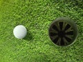 Golf ball on lip of cup of lovely beautiful golf course Royalty Free Stock Photo