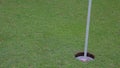 Golf Ball Misses Hole in Just-Missed Putt