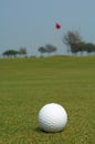 Golf ball near flag