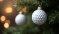 Golf ball ornaments hanging on Christmas tree with bokeh lights background Royalty Free Stock Photo