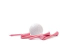Golf Ball with Pink Tees Isolated on White Background Royalty Free Stock Photo