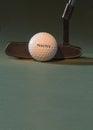 Golf ball and putter