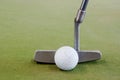 Golf ball with putter Royalty Free Stock Photo