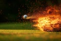 Golf ball racing with fiery trail in high velocity, creating a stunning visual display Royalty Free Stock Photo