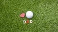 Golf ball with red heart and word DAD Royalty Free Stock Photo