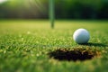 A golf ball sitting next to a hole on a perfect golf green. Generative AI Royalty Free Stock Photo