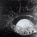 Golf ball splash Royalty Free Stock Photo