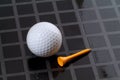 Golf ball and tee Royalty Free Stock Photo