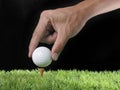 Golf ball on tee Royalty Free Stock Photo