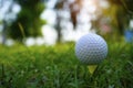 Golf ball on tee in beautiful golf course Royalty Free Stock Photo