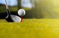 Golf ball on tee with driver Royalty Free Stock Photo