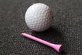 Golf ball tee and marker Royalty Free Stock Photo