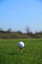 Golf ball tee off Royalty Free Stock Photo