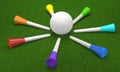 Golf ball and tee pegs rainbow colors on the grass. Royalty Free Stock Photo
