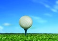 Golf Ball on Tee under Blue Sky Royalty Free Stock Photo