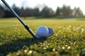 Golf ball teed up and ready for a precise swing with iron club Royalty Free Stock Photo