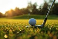 Golf ball teed up and ready for a precise swing with iron club Royalty Free Stock Photo