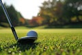 Golf ball teed up and ready for a precise swing with iron club Royalty Free Stock Photo