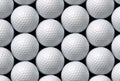 Golf balls aligned horizontal and vertical