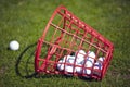 Golf balls bucket on driving range Royalty Free Stock Photo