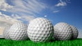 Golf balls on green turf Royalty Free Stock Photo