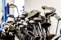 Golf caddy room storage room with sets of poles irons Royalty Free Stock Photo