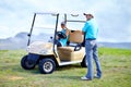 Golf cart, couple or golfers on field for fitness, workout or exercise with teamwork on green course. Woman driver, man Royalty Free Stock Photo