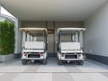 Golf cart, electric car in house area, parking lot waiting to be used as a shuttle service Royalty Free Stock Photo