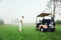 Golf cart man Royalty Free Stock Photo